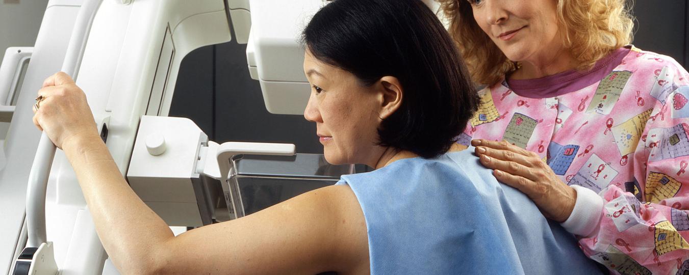 Woman receiving mammogram