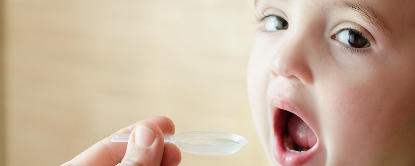 Child taking medicine