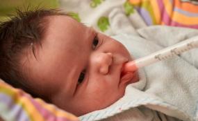 Newborn receiving antibiotics